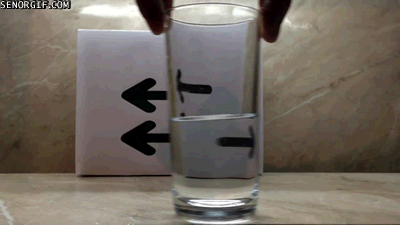 Опустить ложку в стакан с водой