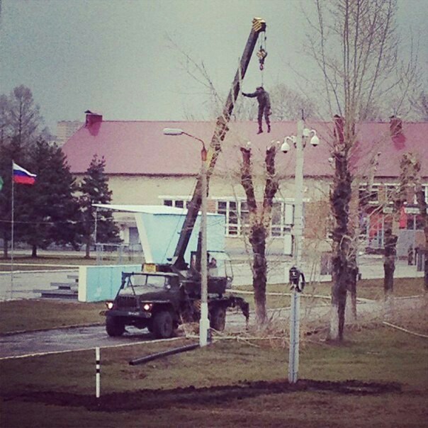 Soldier cuts tree branches - Army, Safety engineering, The photo