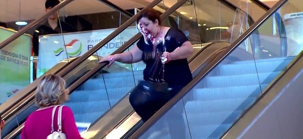 Clown Throwing Pie On Escalator